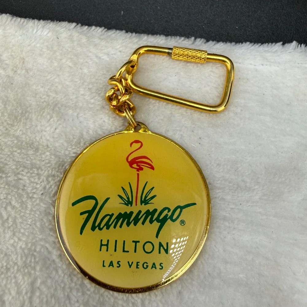 Vintage Flamingo Hilton Keychain Gold Tone Las Vegas Casino Souvenir Round READ